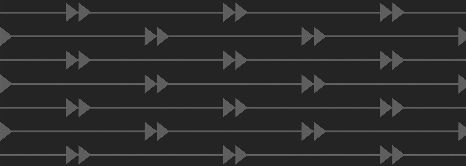 A black patterned background with gray arrows.