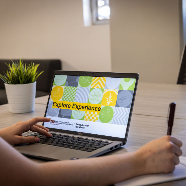 A laptop with Explore Experience page