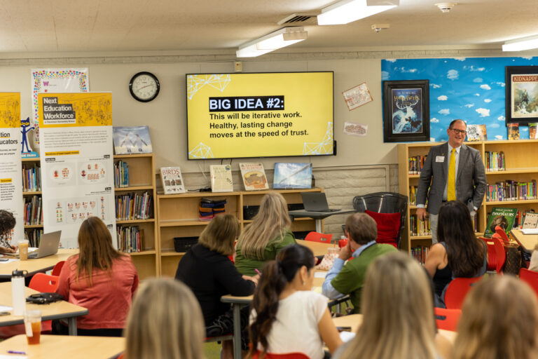 Brent Maddin standing in a classroom.