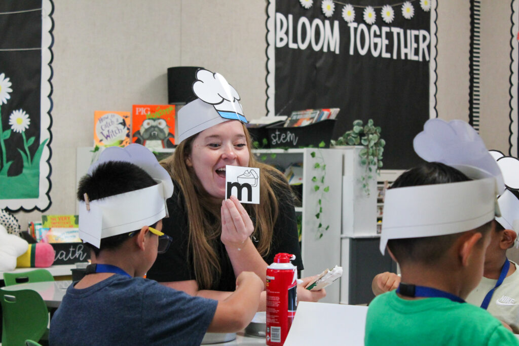 Taylor Murphy teaching kids in her classroom.